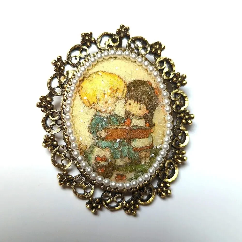 Vintage 1960s Gold Tone Filigree Sugared Oval Children Reading Librarian Brooch